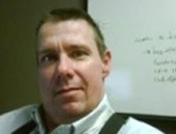 Headshot of gary angel